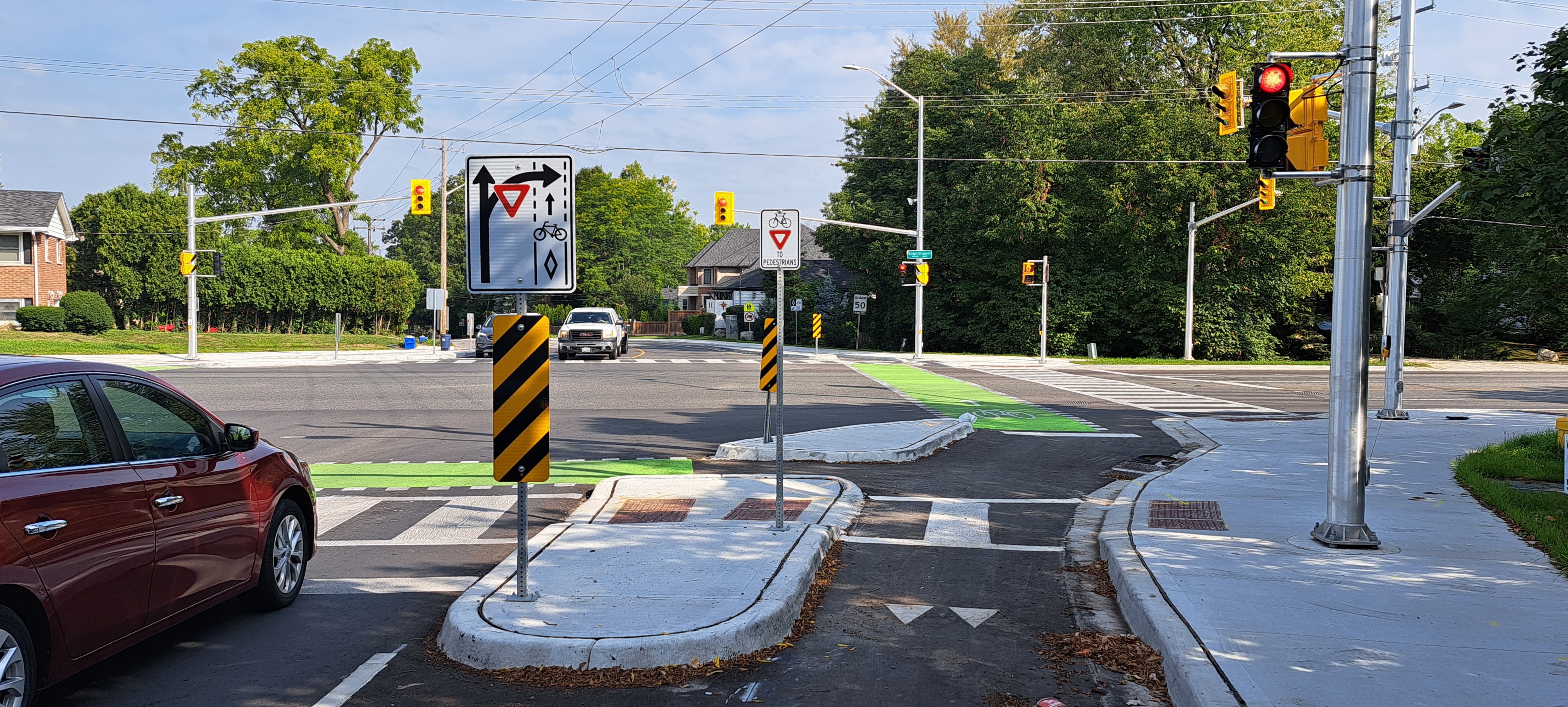 An image of the intersection of Ridout Street and Commissioners Road. 
