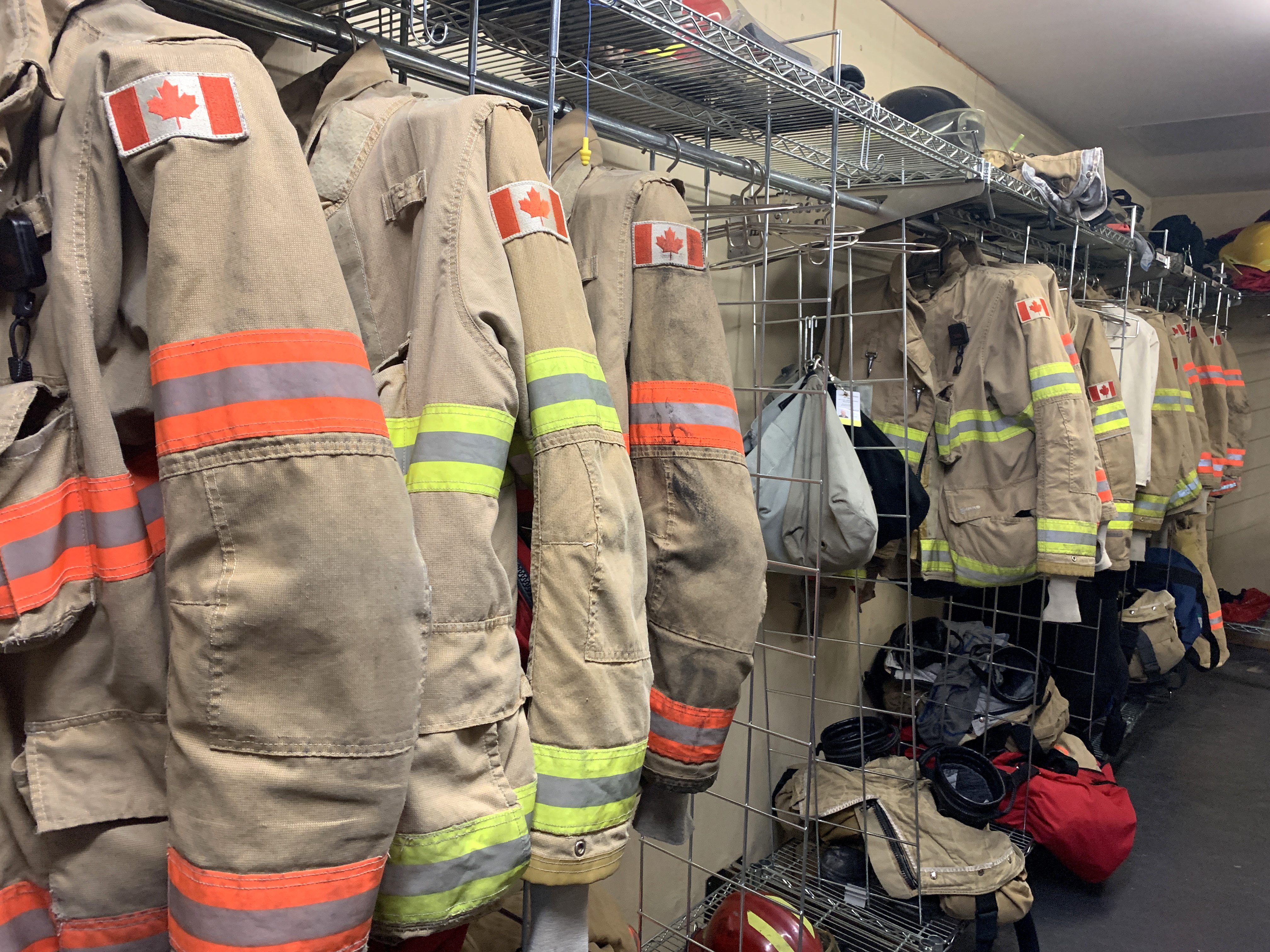 Firefighter Jackets hanging up on a coat rack