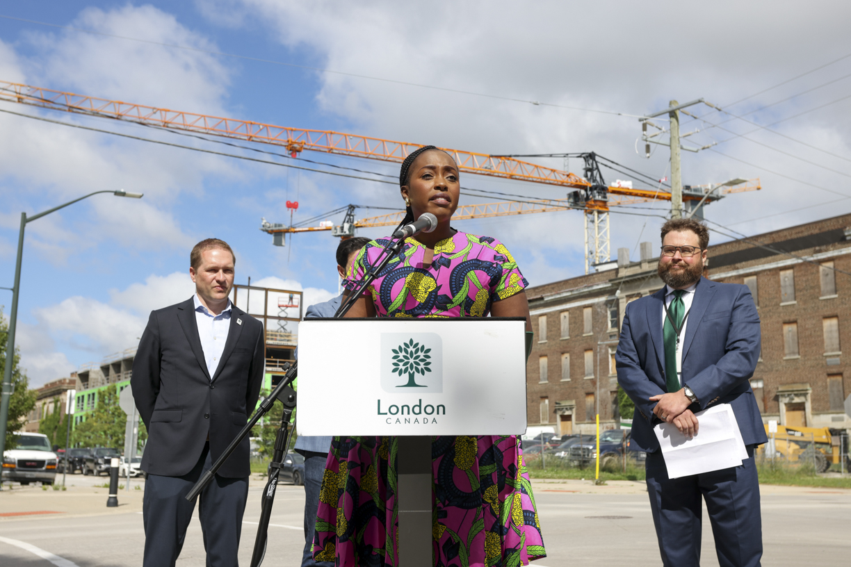 MP Arielle Kayabaga speaking at an announcement in the SoHo neighbourhood and the Old Victoria Hospital Lands currently under construction. 