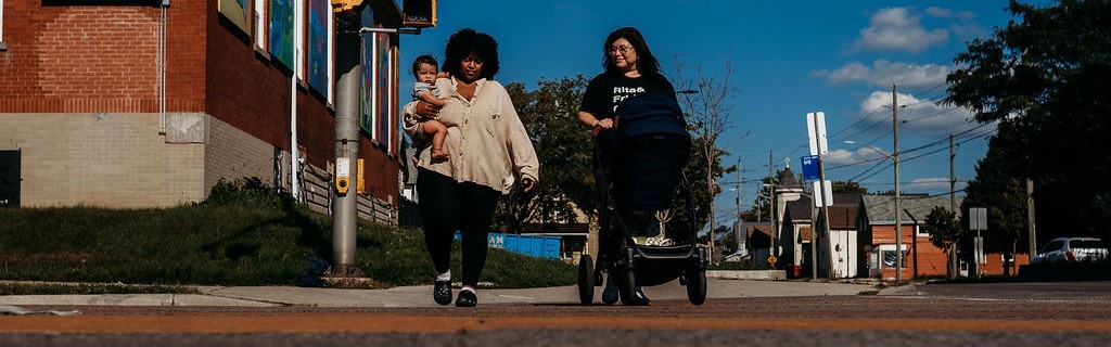 Women walking down crosswalk