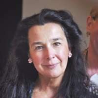 Woman with earrings looking at the camera