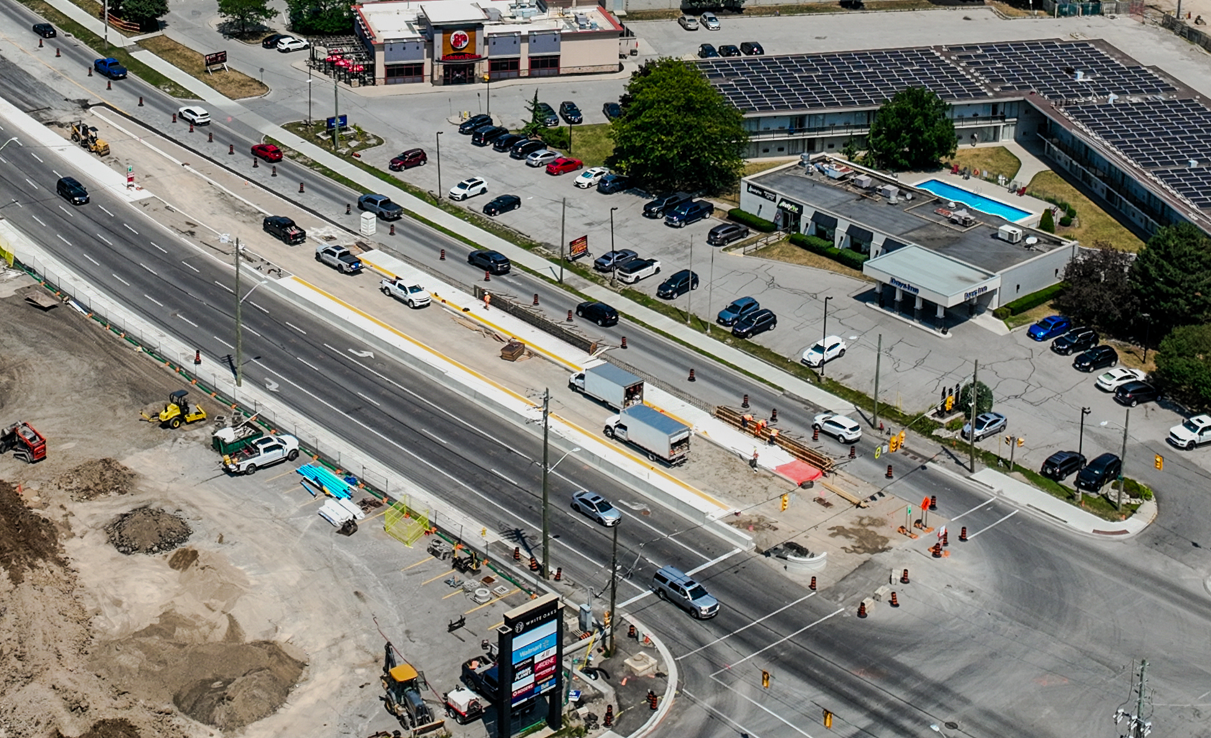 Crews working to install Rapid Transit shelters near White Oaks Mall.