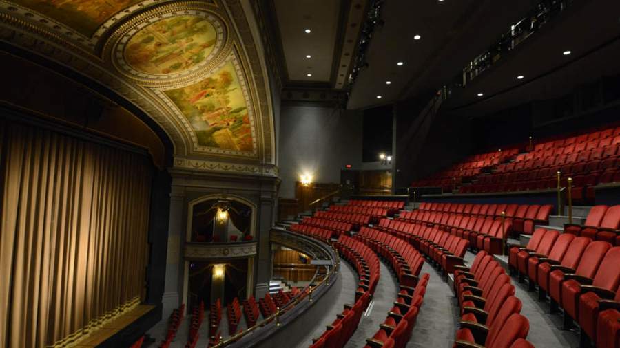 rows of seats inside theatre 