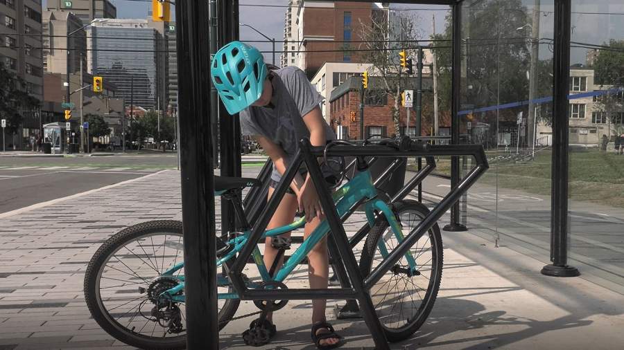 A bike rack with a bike attached to it along Dundas Street in London, Ontario. 