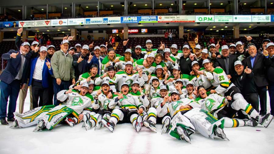 London Knights team members on ice celebrating a win